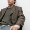 Λινό σακάκι με λεπτομέρειες στις τσέπες Λινό σακάκι με λεπτομέρειες στις τσέπες