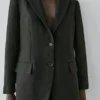 Λινό σακάκι με τσέπες Λινό σακάκι με τσέπες