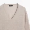 Πλεκτό πουλόβερ oversize με V λαιμόκοψη Πλεκτό πουλόβερ oversize με V λαιμόκοψη
