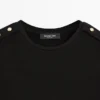 T-shirts με φαρδιά μανίκια και λεπτομέρειες με κουμπιά T-shirts με φαρδιά μανίκια και λεπτομέρειες με κουμπιά