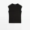 T-shirts με φαρδιά μανίκια και λεπτομέρειες με κουμπιά T-shirts με φαρδιά μανίκια και λεπτομέρειες με κουμπιά
