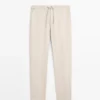Total Look Λινό παντελόνι με λεπτομέρεια στη μέση Total Look Λινό παντελόνι με λεπτομέρεια στη μέση